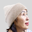 Cashmere merino chunky rib beanie in cream, side view