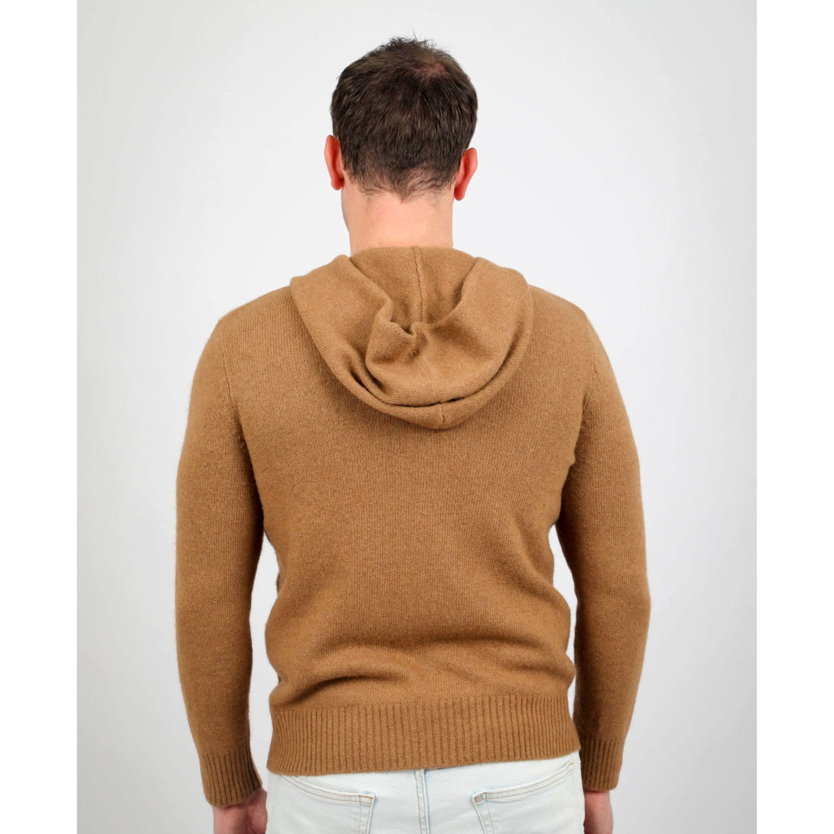 Detail of knit hood and zip on baby camel wool hoodie